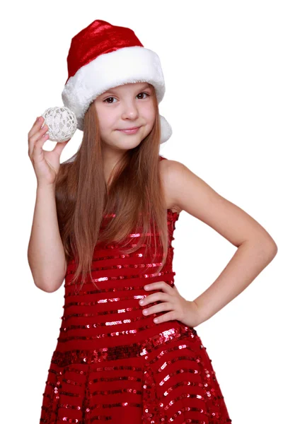 Menina segurando decoração de Natal — Fotografia de Stock