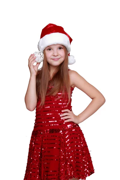 Girl holding christmas decoration — Stock Photo, Image