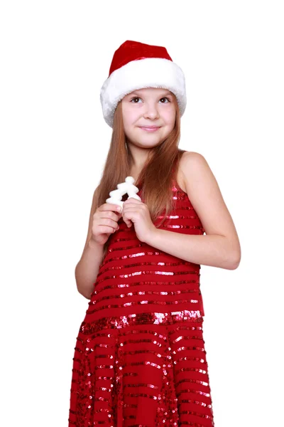 Dívka, která nosí drží Vánoční dekorace — Stock fotografie