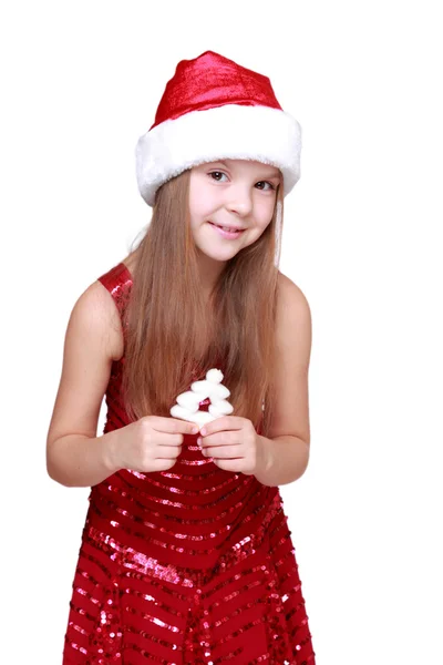 Girl holding Christmas decoration — Stock Photo, Image