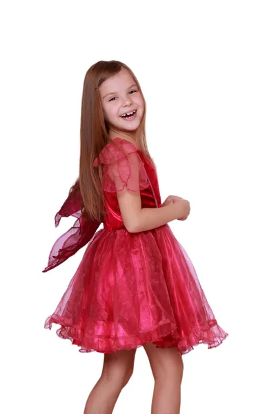 美しい赤いドレスを着ている少女 — ストック写真