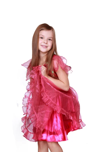 Ragazza mostrando il suo costume di carnevale rosa — Foto Stock