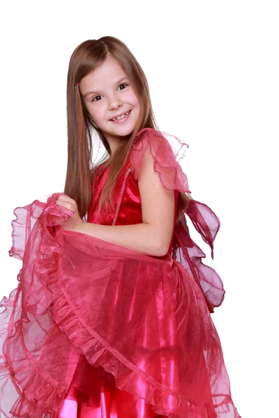 Meisje toont haar roze carnaval-kostuum — Stockfoto