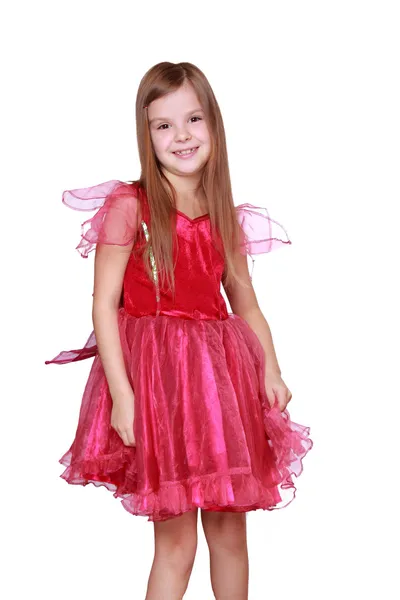 Fille montrant son costume de carnaval rose — Photo