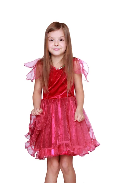 Girl showing her pink carnival costume — Stock Photo, Image