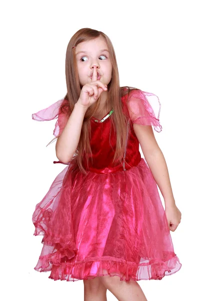 Lány mutatja neki rózsaszín farsangi jelmez — Stock Fotó