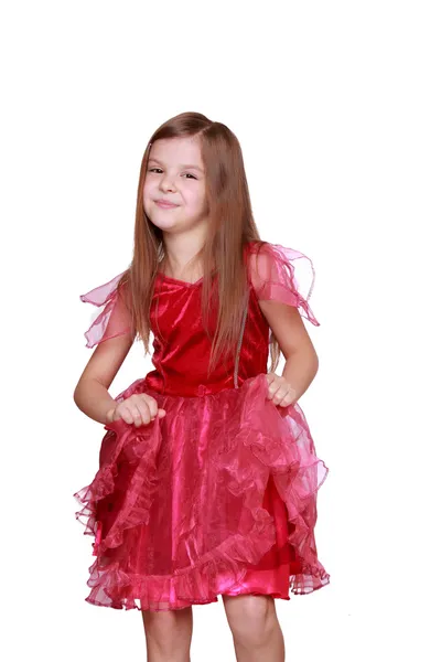 Menina mostrando seu traje de carnaval rosa — Fotografia de Stock