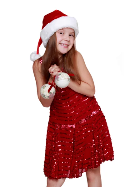 Little girl wearing a Santa Hat Stock Picture