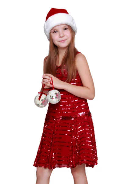 Little girl wearing a Santa Hat Royalty Free Stock Photos