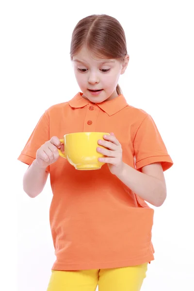 Szép kislány, csésze tea — Stock Fotó