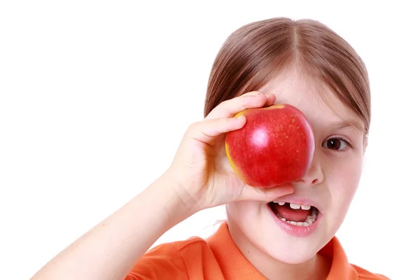 Adorable dziewczyna z czerwonym jabłkiem — Zdjęcie stockowe