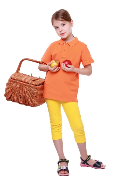 Entzückendes Mädchen mit roten Äpfeln — Stockfoto