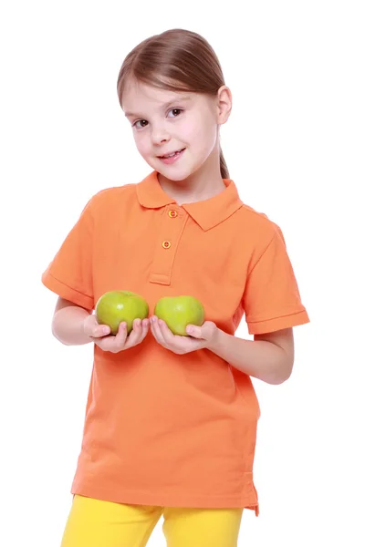 Girl with green apples — Stock Photo, Image