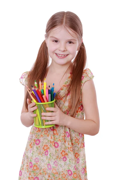 Girl with colored pencils in hands — Stock Photo, Image