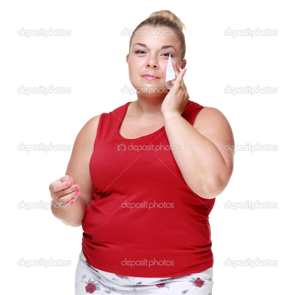Woman wipes his face with a napkin