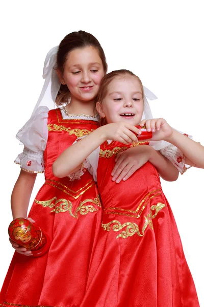 Girls holding traditional matryoshka doll — Stock Photo, Image