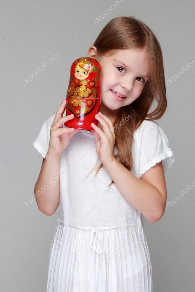 Child with Russian matryoshka