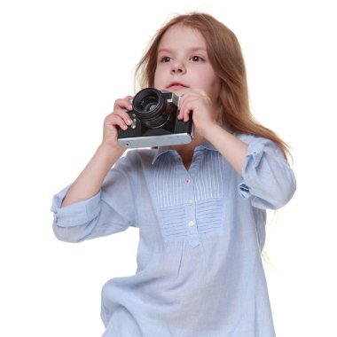 fotoğraf makinesi tutan genç kız