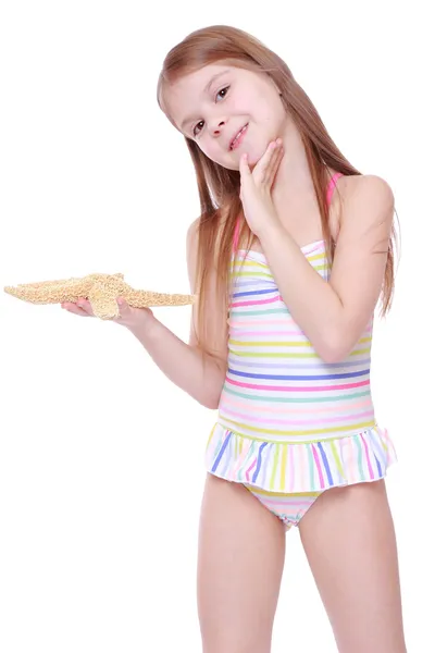 Girl with starfish — Stock Photo, Image