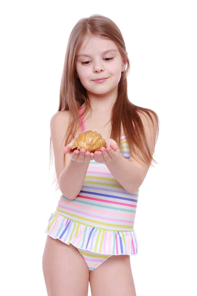 Girl in swimsuit with shell — Stock Photo, Image