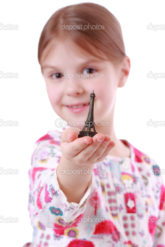 Girl holding Eiffel Tower