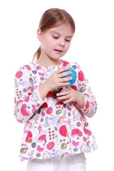 Menina com o globo nas mãos — Fotografia de Stock