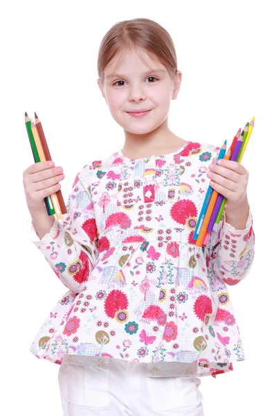 Menina com lápis coloridos — Fotografia de Stock
