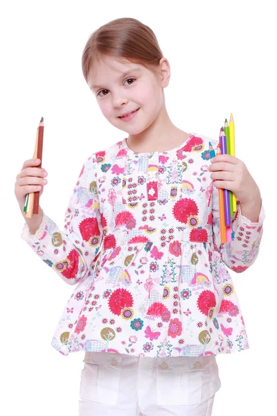 Fille avec crayons de couleur — Photo
