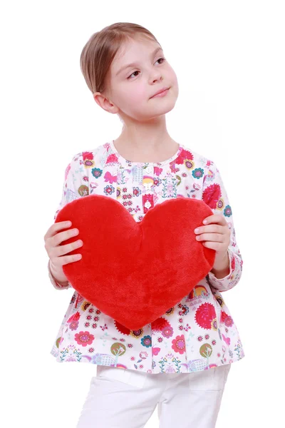 Chica joven con enorme corazón rojo —  Fotos de Stock