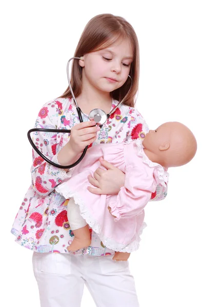 Niño jugando con muñeca de juguete — Foto de Stock