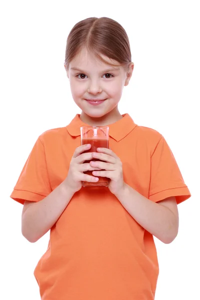 Meisje met glas tomatensap — Stockfoto