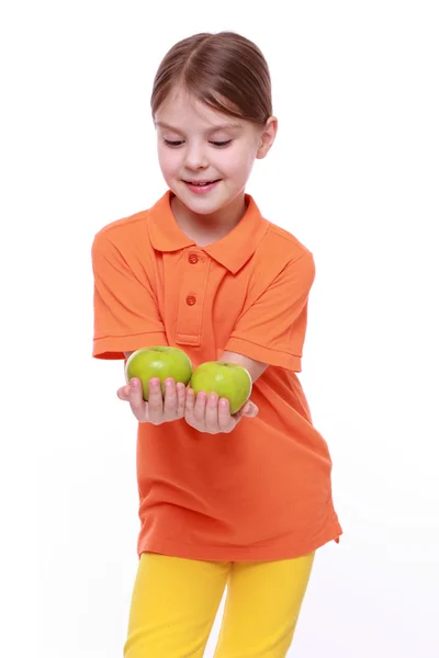 Girl with green apples — Stock Photo, Image