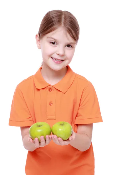 Girl with green apples — Stock Photo, Image
