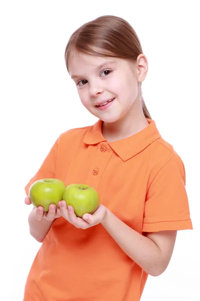 Girl with green apples — Stock Photo, Image