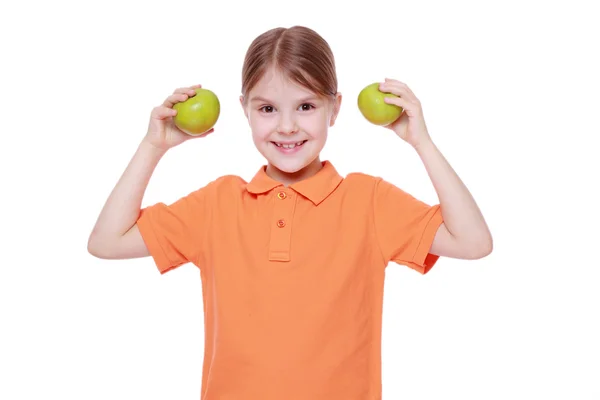 Girl with green apples — Stock Photo, Image