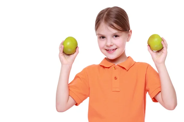 Chica con manzanas verdes —  Fotos de Stock