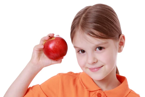 Mädchen mit rotem Apfel — Stockfoto