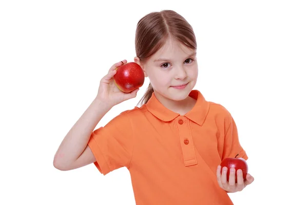 Chica con manzanas rojas —  Fotos de Stock