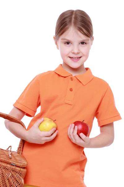 Fille aux pommes et panier — Photo