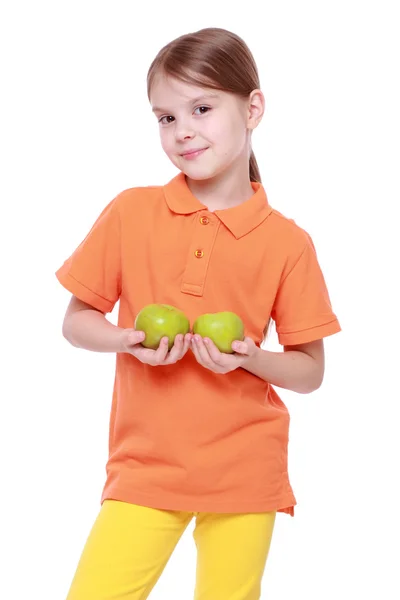 Girl with green apples — Stock Photo, Image