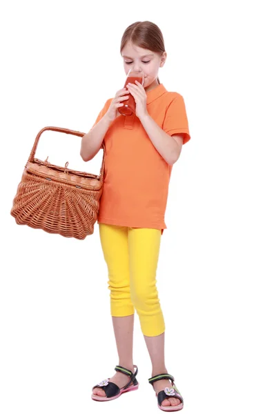 Little girl drinking tomato juice — Stock Photo, Image