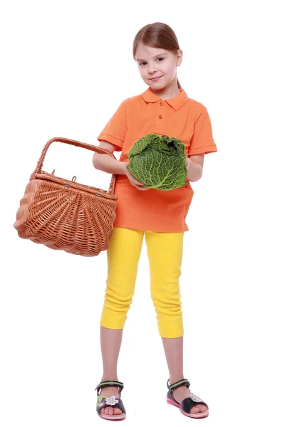 Girl holding cabbage — Stock Photo, Image