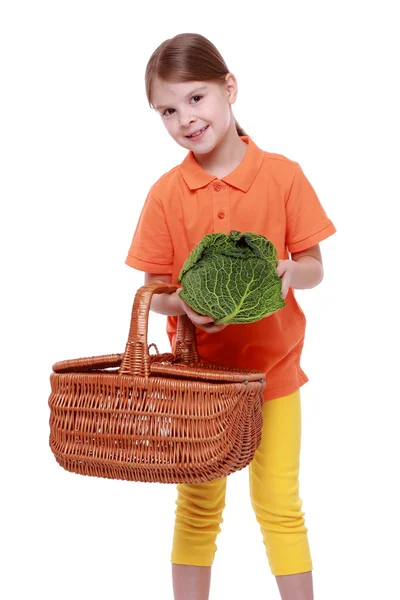 Girl holding cabbage — Stock Photo, Image