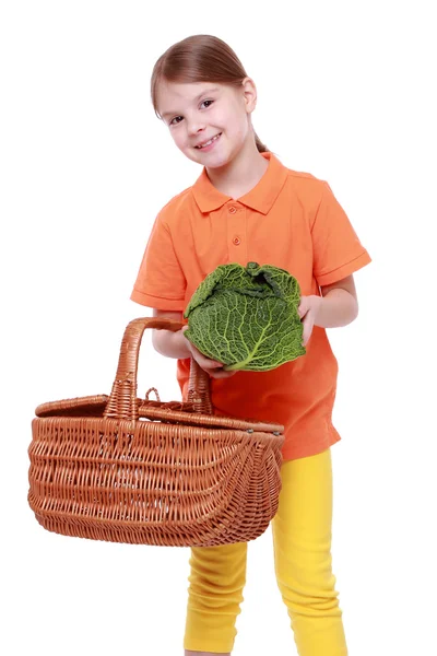 Girl holding cabbage — Stock Photo, Image