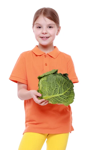 Girl holding cabbage — Stock Photo, Image