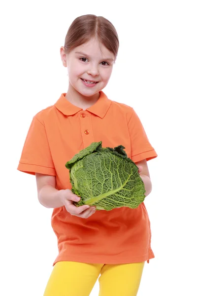 Girl holding cabbage — Stock Photo, Image