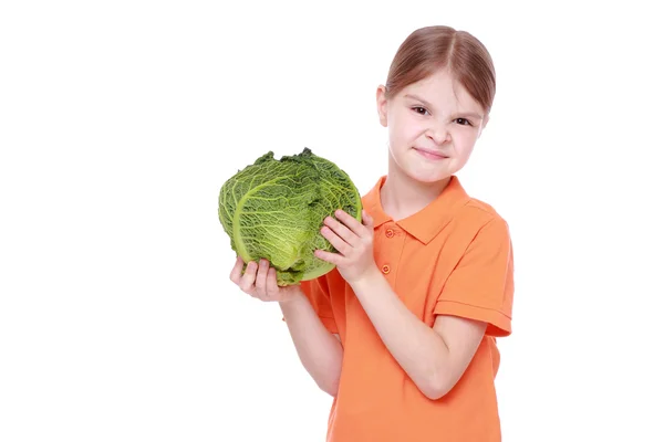 Girl holding cabbage — Stock Photo, Image