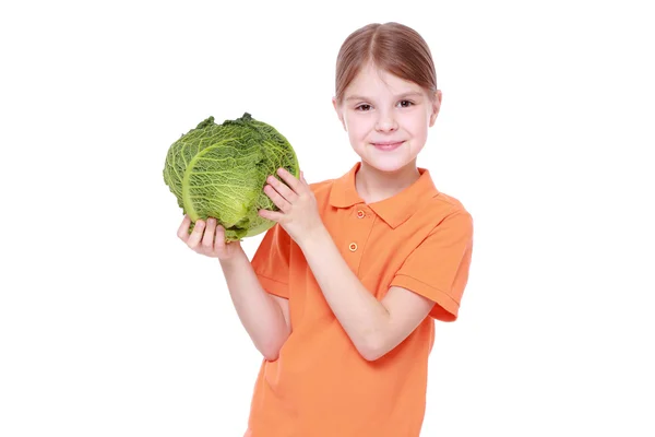 Girl holding cabbage — Stock Photo, Image