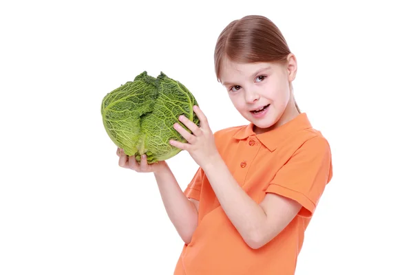 Girl holding cabbage — Stock Photo, Image