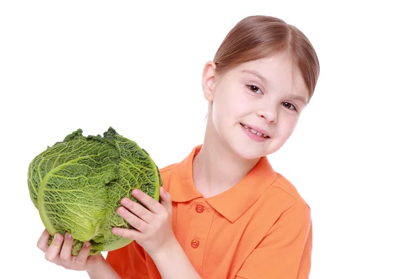 Girl holding cabbage — Stock Photo, Image